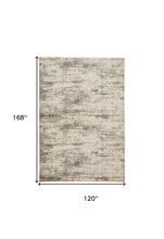 4' X 6' Ivory And Brown Abstract Area Rug