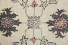 4' X 6' Ivory Blue And Tan Wool Floral Tufted Handmade Stain Resistant Area Rug