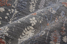 8' X 10' Gray Ivory And Orange Floral Power Loom Area Rug