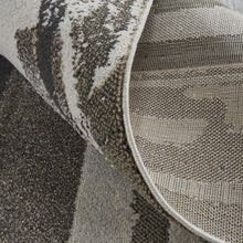 4' X 6' Brown And Ivory Abstract Power Loom Distressed Stain Resistant Area Rug