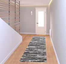 4' X 6' Brown And Ivory Abstract Power Loom Distressed Stain Resistant Area Rug