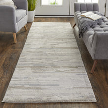 4' X 6' Brown And Ivory Abstract Power Loom Distressed Stain Resistant Area Rug