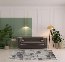 4' X 6' Ivory Brown And Gray Abstract Power Loom Stain Resistant Area Rug