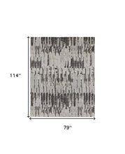 4' X 6' Ivory Brown And Gray Abstract Power Loom Stain Resistant Area Rug