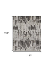 4' X 6' Ivory Brown And Gray Abstract Power Loom Stain Resistant Area Rug