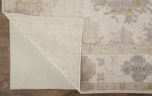 4' X 6' Ivory Tan And Blue Floral Hand Knotted Stain Resistant Area Rug