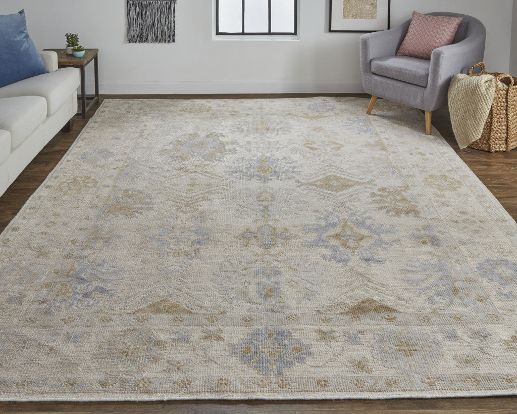 4' X 6' Ivory Tan And Blue Floral Hand Knotted Stain Resistant Area Rug
