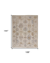 4' X 6' Ivory Tan And Blue Floral Hand Knotted Stain Resistant Area Rug