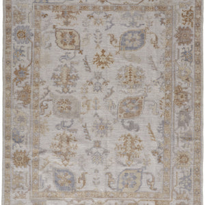 4' X 6' Ivory And Tan Floral Hand Knotted Stain Resistant Area Rug
