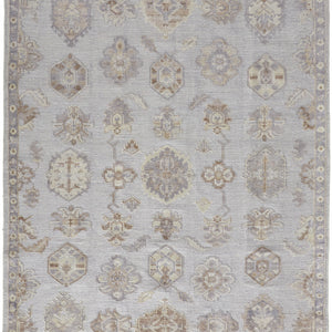 4' X 6' Ivory Silver And Tan Floral Hand Knotted Stain Resistant Area Rug