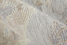 4' X 6' Ivory Silver And Tan Floral Hand Knotted Stain Resistant Area Rug