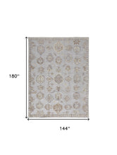 4' X 6' Ivory Silver And Tan Floral Hand Knotted Stain Resistant Area Rug