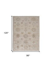 4' X 6' Tan And Brown Floral Hand Knotted Stain Resistant Area Rug