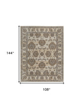 9' X 12' Tan Ivory And Brown Power Loom Area Rug