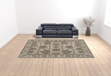9' X 12' Tan Ivory And Brown Power Loom Area Rug