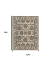 9' X 12' Tan Ivory And Brown Power Loom Area Rug