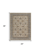 9' X 12' Tan Ivory And Gray Power Loom Area Rug