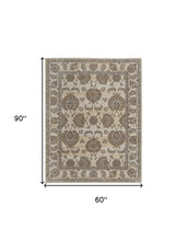 9' X 12' Tan Ivory And Brown Power Loom Area Rug