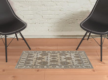 9' X 12' Tan Ivory And Brown Power Loom Area Rug