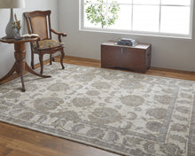 9' X 12' Tan Ivory And Brown Power Loom Area Rug