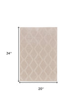 2' X 3' Ivory And Tan Geometric Stain Resistant Area Rug
