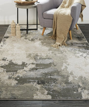 2' X 3' Ivory And Gray Abstract Stain Resistant Area Rug