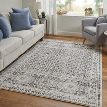 Ivory Taupe And Gray Abstract Stain Resistant Area Rug - 2' x 3'