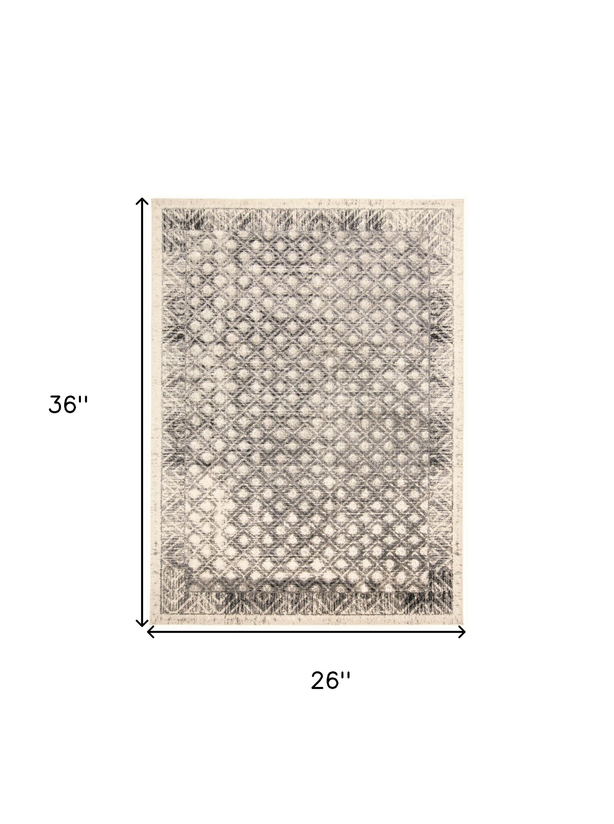 2' X 3' Ivory Black And Taupe Abstract Stain Resistant Area Rug