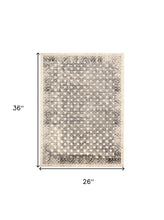 2' X 3' Ivory Black And Taupe Abstract Stain Resistant Area Rug