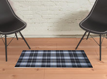 2' X 3' Black Blue And White Abstract Hand Woven Stain Resistant Area Rug