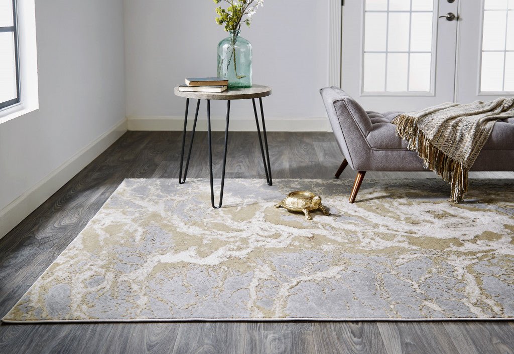 Ivory Silver And Gold Abstract Stain Resistant Area Rug - 2' x 3'