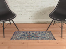 2' X 3' Blue Red And Ivory Abstract Power Loom Distressed Stain Resistant Area Rug