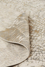 Ivory Tan And Gray Abstract Area Rug - 2' x 3'