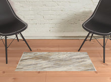 2' X 3' Ivory Tan And Brown Abstract Area Rug