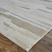 2' X 3' Ivory Tan And Brown Abstract Power Loom Distressed Stain Resistant Area Rug