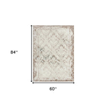 5' X 7' Cream Damask Stain Resistant Area Rug