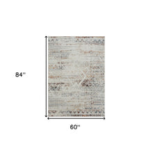 5' X 7' Ivory Tribal Distressed Washable Area Rug