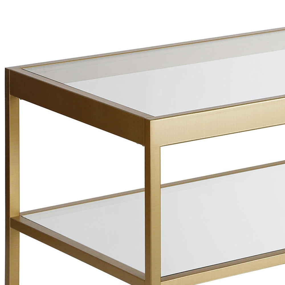 45" Gold and Glass Rectangular Coffee Table With Shelf
